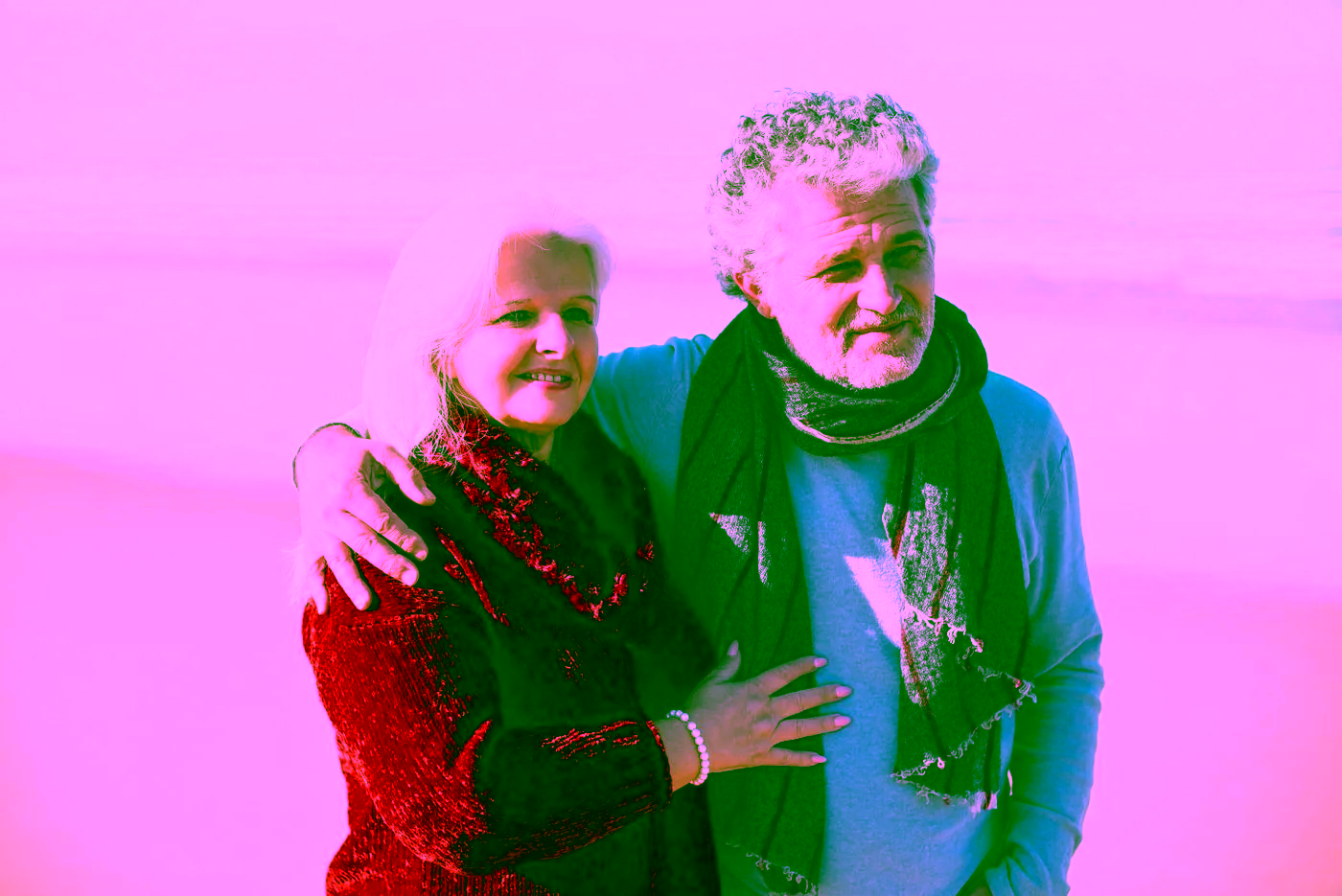 An older couple spending time together by the sea