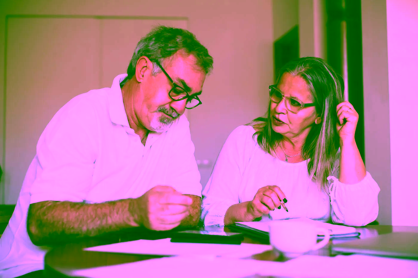 A couple reviewing their financial records together
